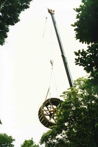 Craneage of repaired waterwheel. 